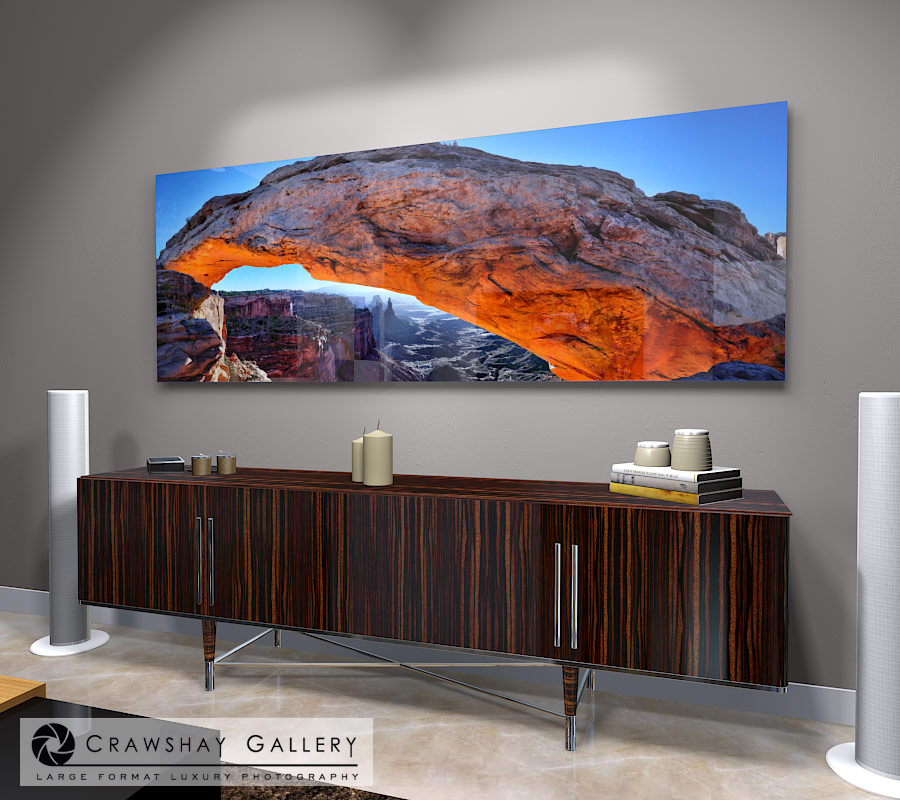 large format photograph of Mesa Arch Sunrise depicted in room