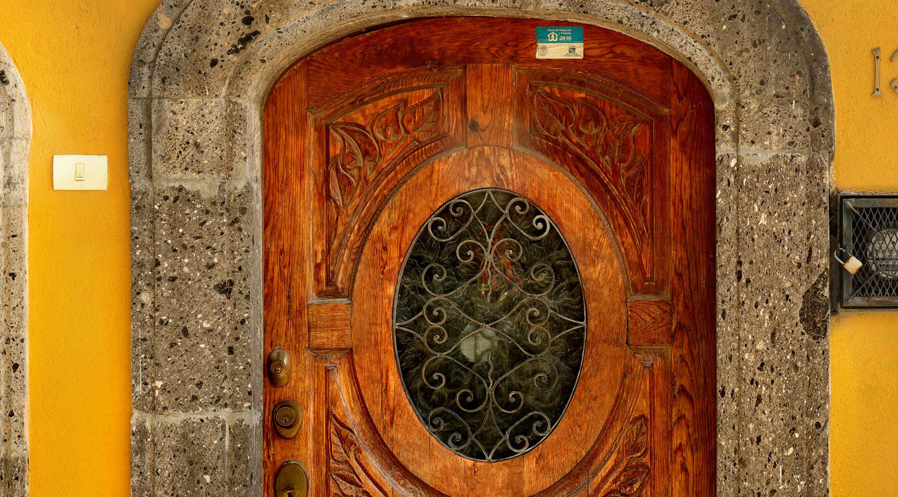 Close up of large format photograph of Classic Mexican Doors and House